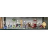 A Shelf of Art Glass includes Caithness Vases and decorative glasses