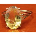 10ct yellow gold ring set with a large citrine style gem stone. [Ring size P] [2.69Grams]