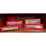 A Shelf of Hornby Train items boxed includes wagons