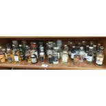 A large collection of whisky miniatures