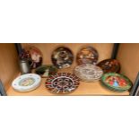 A Shelf of collectors plates includes Royal Crown Derby imari large cabinet plate, Royal doulton