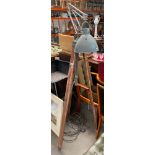 An Antique industrial Angle poised Lamp on tri pod supports