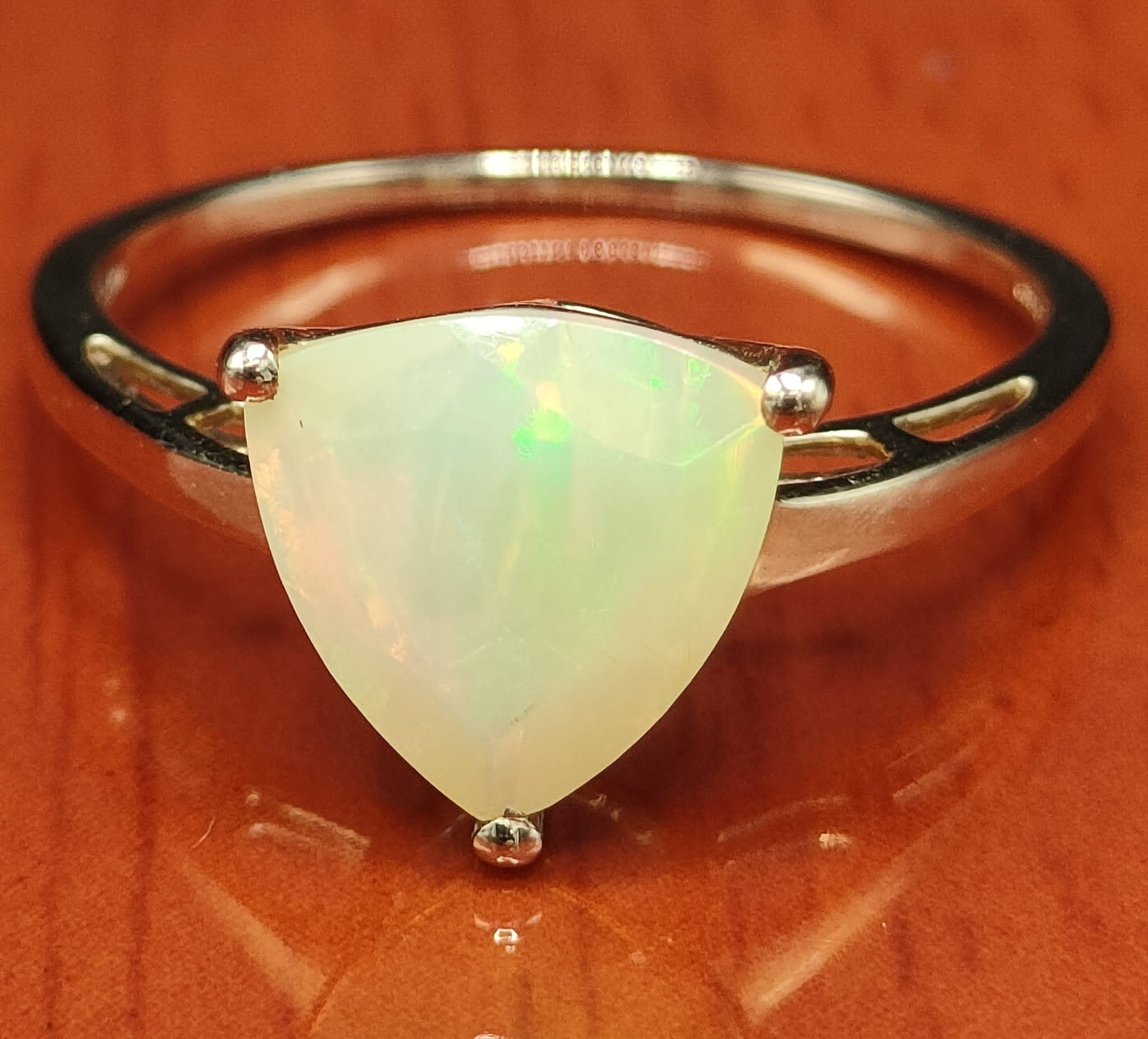 10ct yellow gold ring set with an Ethiopian opal stone. [Ring size P] [1.81Grams] - Image 2 of 2