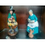 Two Royal Doulton figures ' The Mask Seller HN2103' and 'The Favourite HN2249'