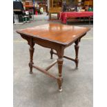 Antique dining room table on turned supports