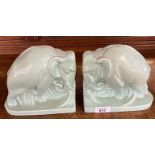 A pair of Poole Pottery Elephant bookends C1940,s designed by Harold Brownsword finished in Ice