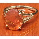 9ct yellow gold ring set with a large fire opal stone. [Ring size N] [2.17Grams]