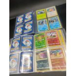 Two albums of various Pokemon cards