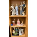 3 Shelves of collectables to include a Royal Doulton bulldog , Nao figures and more