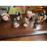 A Collection of Royal Doulton Small toby jugs includes Christopher Columbus, Sir Winston