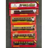 A selection of Hornby vehicles includes Flying Scotsman with carriages