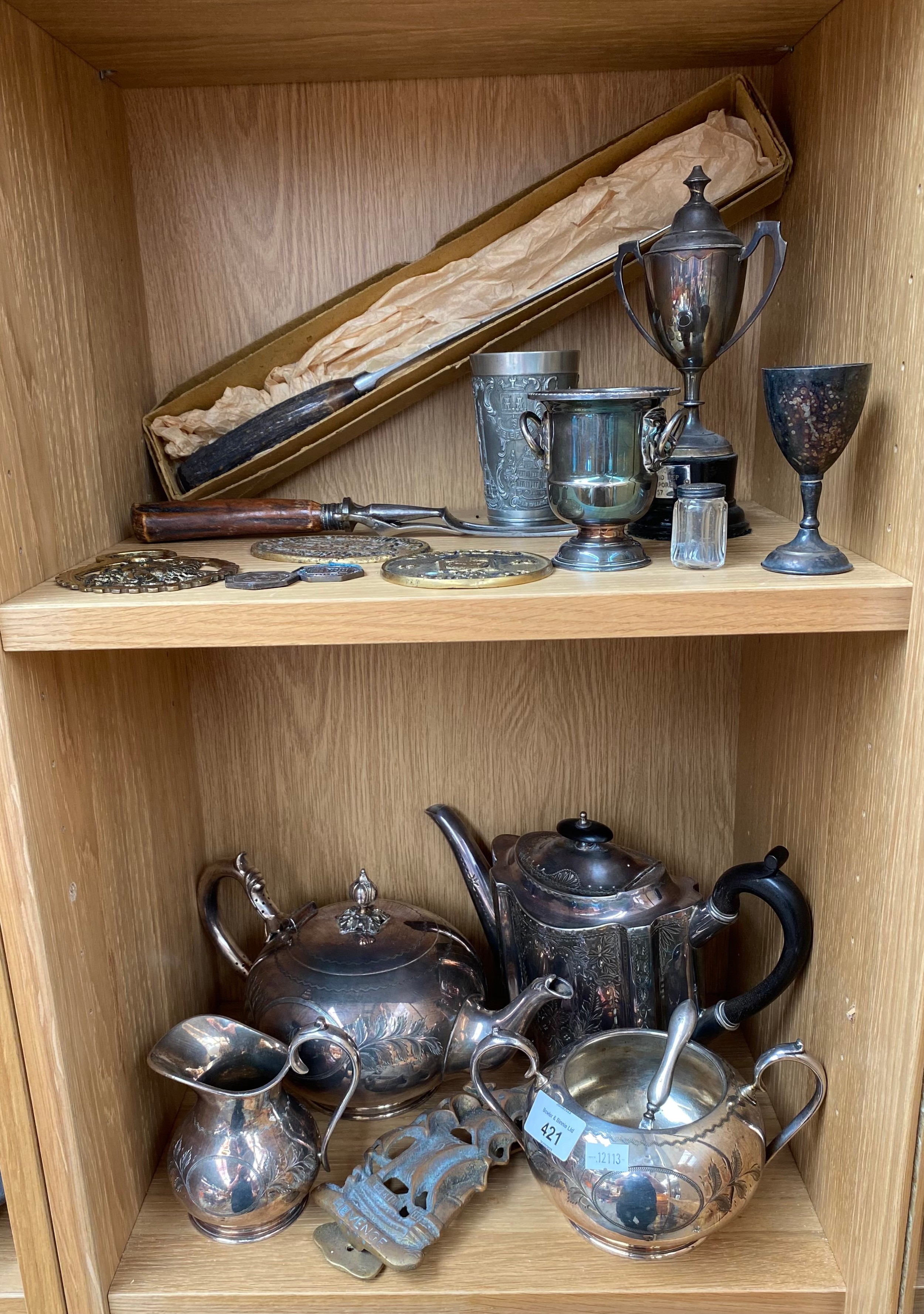2 Shelves of silver plated wares includes 3 piece silver plated tea set