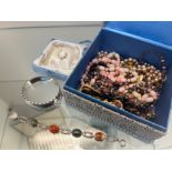 Jewel box containing costume jewellery necklaces, Birmingham silver bangle with gold relief designs,