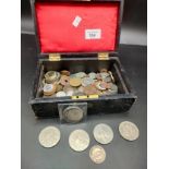 A box of mixed British and world coins