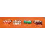 Four 925 Silver and gem stone rings include Green and orange opalescent stone set rings.