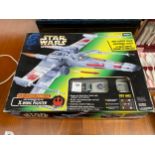 A Boxed Starwars 1990s X wing fighter