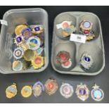 Two trays of collectable Scottish dance badges and medals.