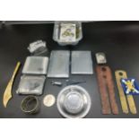 A box of military items to include trench art items, The Cameronians vesta case and military uniform