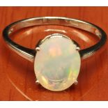 10ct yellow gold ring set with a single Ethiopian opal stone. [Ring size P] [1.71Grams]