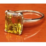 10ct yellow gold ring set with a large citrine style gem stone. [Ring size P] [2.49Grams]