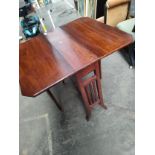 Victorian Sutherland drop leaf table.