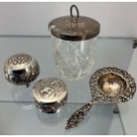 Dutch silver tea strainer, Birmingham silver top and crystal preserve pot together with Anglo Indian