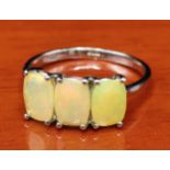 10ct white gold ladies ring set with three Ethiopian opal stones. [Ring size P] [2.16Grams]