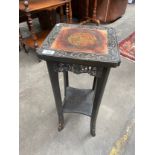 A 19th century poker work table with dragon hand painted design