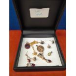 A Collection of 9ct yellow gold earrings, 9ct gold necklace with 9ct gold and garnet pendant, 9ct