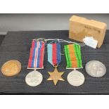 Three WW2 Medals with ribbons and two vintage Amateur Gardening medallion coins.