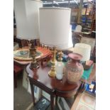 A Mahogany hall table along with a selection of table lamps includes brass large table lamps and