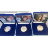 Three silver coin boxed by The Royal Mint; 2007 Diamond Wedding silver proof crown x2 and The Golden