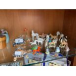 A Selection of collectables includes 1st edition wade figures and glass animals