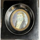 19th century portrait painting of a gentleman of some importance. Fitted within a brass and black