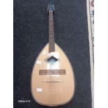 The Bouzouki [A Greek long necked lute and also found in Ireland] Standing, 100 cm tall and 34 cm