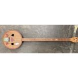 An Eastern themed 3 string musical instrument