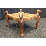 Middle Eastern stool, the corners shaped into carved animal form [27.5x53.x39cm]