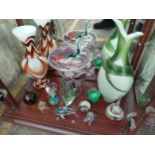 A shelf of art glass vases includes Carlo Moretti Mid-Century Modern Opaline Vase, animal figures