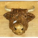 A Farm House bull head wall mounted display