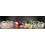 A Shelf of Paperweights , crystal bowl and glass paperweights