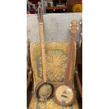 2 Eastern themed 3 stringed banjo's