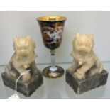 A Pair of soapstone foo dogs seated on raised plinths. Together with a Japanese Imari pattern