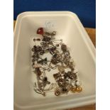 A Tub containing a collection of silver jewellery to include mostly earrings, Silver thistle