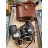 A Pair of Swift Audubon mark 2 binoculars with leather casing