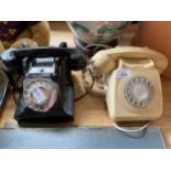 Two vintage bakelite telephones