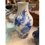 A Large 19th century oriental blue and white vase depicting bird scene