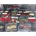 Two shelves of collectable steam engine models and Fire engine models; Produced by Days Gone,
