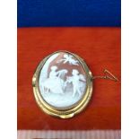 Victorian Pinchbeck carved cameo brooch, Gilt metal framed body. cameo carved with seated lady and