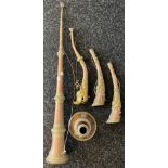 A Lot of Tibetan copper and brass worked trumpets/ horn instruments. Highly decorative dragon