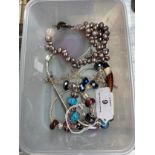 A Selection of Silver jewellery to include charm bracelets along with silver chains and pendants